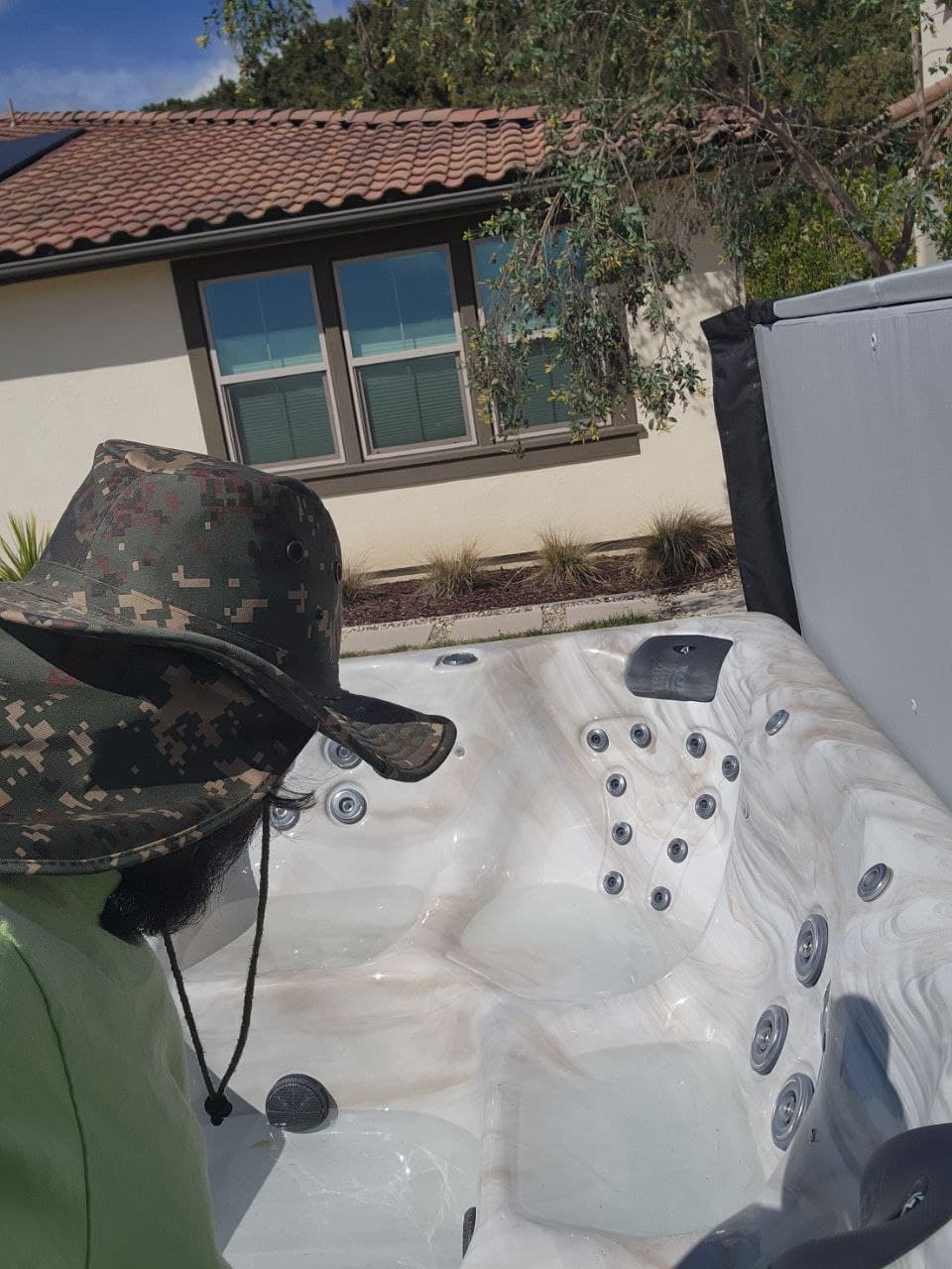 Joe cleaning his hot tub in San Diego while his AI agents handle business operations